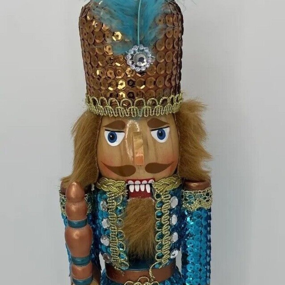 ISO - Pier 1 Imports blue turquoise Sequin nutcracker